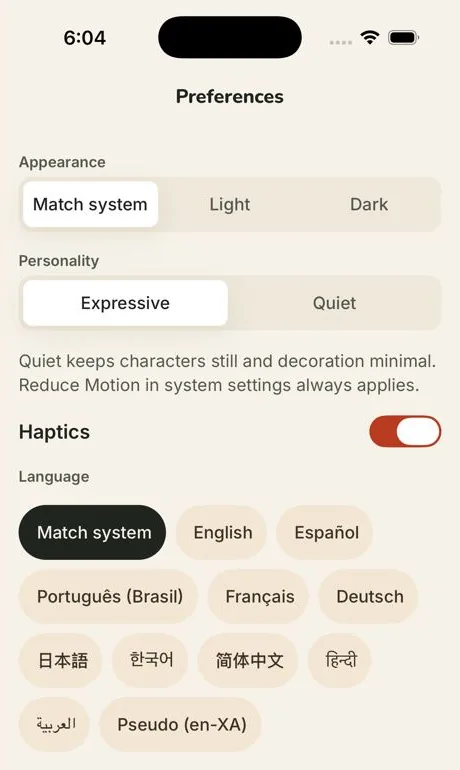 Preferences screen with appearance (Match system, Light, Dark), personality (Expressive, Quiet), a haptics switch and ten languages.